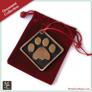 ornament - Cat-Paw Print - cast bronze - natural rubbed finish - red velvet bag