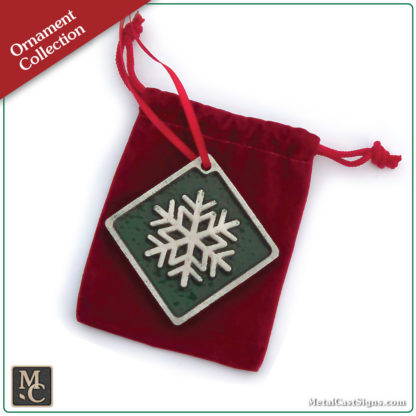 Snowflake ornament - cast aluminum - green powder coat background