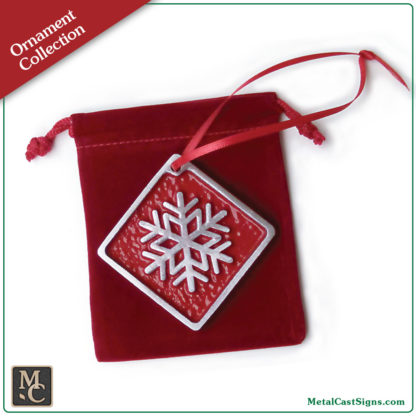 Snowflake ornament - cast aluminum - red powder coat background