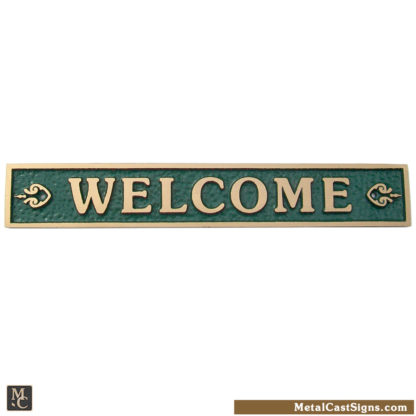 welcome sign - cast bronze w/green background