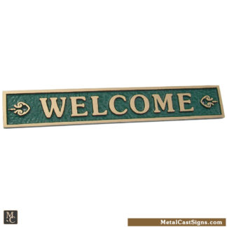 welcome sign - cast bronze w/green background